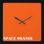 Space orange square wall clock<br><div class="desc">Show your colours with pride!  Ever dreamed of becoming an astronaut? Then this should make you feel in touch with your dream for this shade of international orange is the colour of astronaut suits.</div>