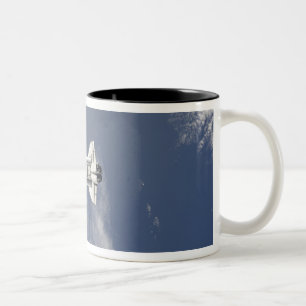 Space Shuttle Atlantis and a Russian spacecraft Two-Tone Coffee Mug
