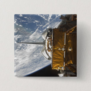 Space Shuttle Atlantis' payload bay backdropped 2 Inch Square Button