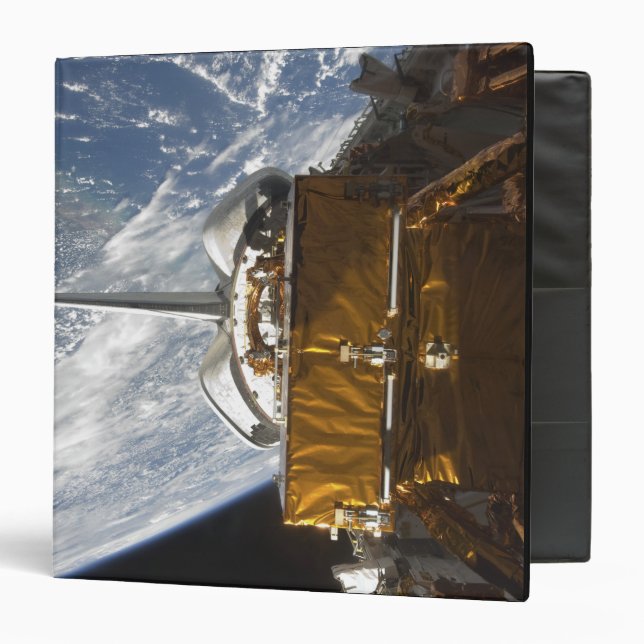 Space Shuttle Atlantis' payload bay backdropped Binder (Front/Inside)