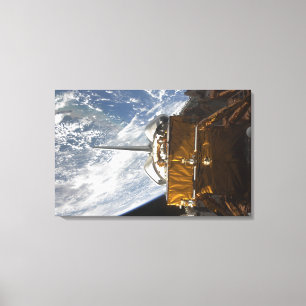 Space Shuttle Atlantis' payload bay backdropped Canvas Print
