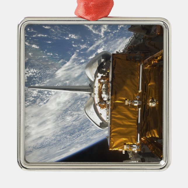 Space Shuttle Atlantis' payload bay backdropped Metal Ornament (Front)