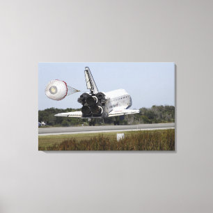 Space shuttle Atlantis unfurls its drag chute Canvas Print