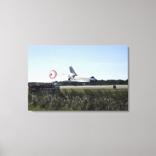 Space shuttle Atlantis unfurls its drag chute Canvas Print