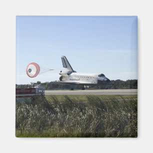 Space shuttle Atlantis unfurls its drag chute Magnet