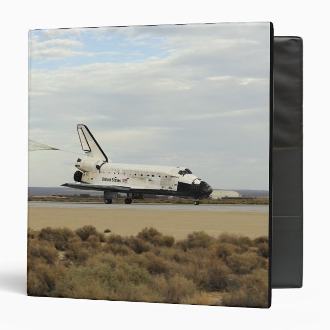 Space Shuttle Discovery deploys its drag chute Binder (Front/Inside)