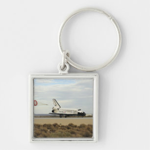 Space Shuttle Discovery deploys its drag chute Keychain