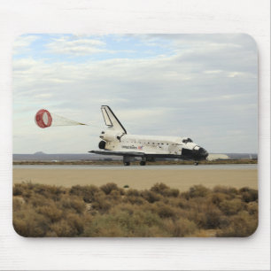 Space Shuttle Discovery deploys its drag chute Mouse Pad