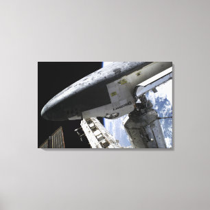 Space Shuttle Discovery docked Canvas Print