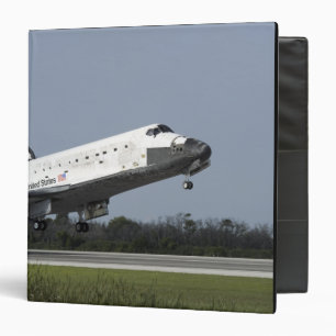 Space shuttle Discovery lands on Runway 33 2 Binder