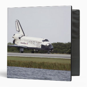 Space Shuttle Discovery on the runway Binder