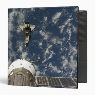 Space Shuttle Endeavour and a Soyuz spacecraft Binder