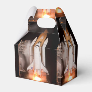 Space Shuttle Endeavour Lifts Off Favor Box