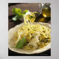 Spaghetti with basil and parmesan on plate,