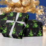 Sparkling Green Ribbon Christmas Trees Wrapping Paper<br><div class="desc">Contemporary green ribbon Christmas trees with red stars and white twinkling sparkles on black.
Background colour can be changed.</div>