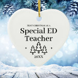 Special ED Teacher New Job Christmas Ceramic Ornament<br><div class="desc">First Christmas as a special ED teacher heart ornament for a coworker,  friend,  or family member. Elegant porcelain ceramic holiday ornaments in white with black lettering. Featuring Christmas trees and stars.</div>