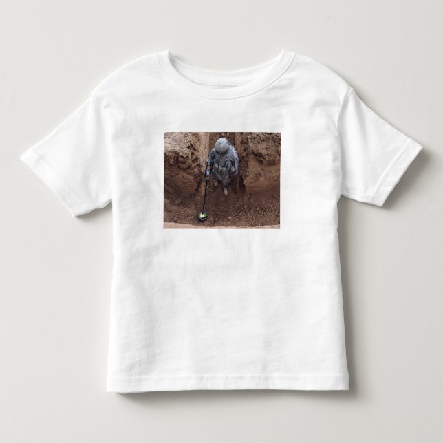 Specialist searches for a weapons cache toddler t-shirt (Front)