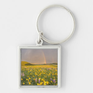 Spectacular wildflower meadow at sunrise in 2 keychain