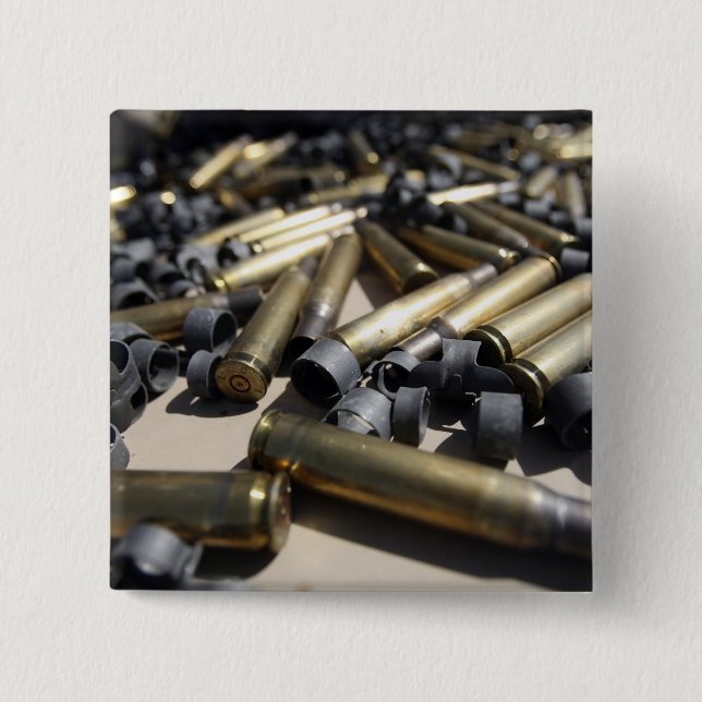 Spent brass and disintegrated links 2 inch square button (Front)