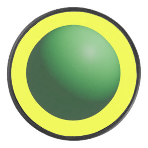 Sphère verte sur palet jaune