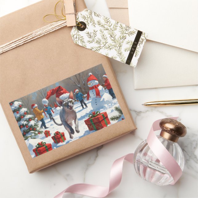 Sphynx Cat Running in Snow with Christmas Hat Sticker (Gifting)