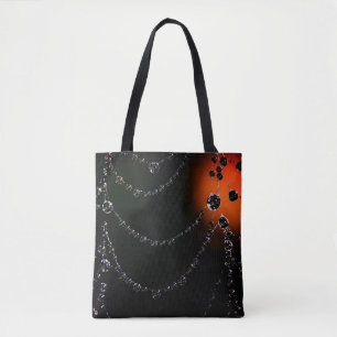 Spiderweb jewels and harvest moon black orange  tote bag