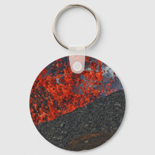 Splash of hot lava from crater of erupting volcano keychain