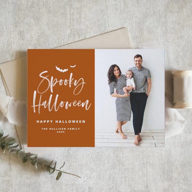 Spooky Halloween Brush Lettering Orange Photo Holiday Card (Send Halloween cheer with this photo card featuring bold script and a warm autumn color palette.)