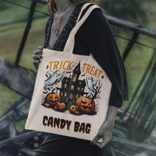 Spooky Halloween house with pumpkins at dusk Tote Bag