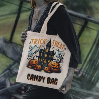 Spooky Halloween house with pumpkins at dusk Tote Bag