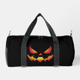 Spooky Halloween pumpkin demon face on fire Duffle Bag
