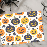 Spooky Orange and Blue Jack-o'-Lanterns with Stars Tissue Paper<br><div class="desc">Dress up your gifts with this charming pumpkin tissue paper! The design features a festive pattern of classic jack-o'-lanterns in shades of orange and dark blue,  scattered among whimsical stars and foliage. It's the perfect way to add a touch of rustic Halloween charm to any gift bag or box.</div>