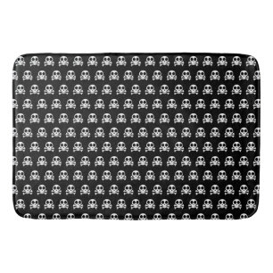 spooky skull on a black background bath mat