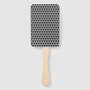 spooky skull on a black background hand fan