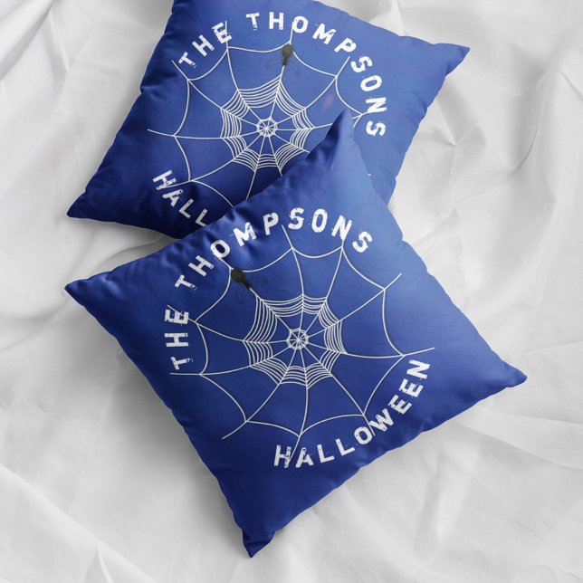 Spooky Spider in Spider Web Personalized Throw Pillow (Blue Halloween spider web pillow with personalized family name and spooky spider decor.)