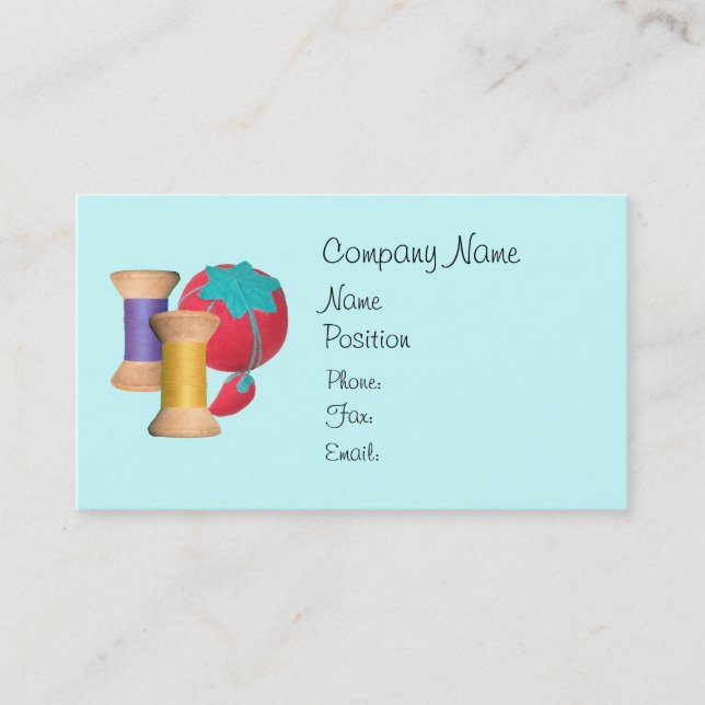 Spools of Thread and Pin Cushion Business Card (Front)