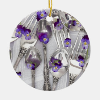 spoons and forks with violets ceramic ornament