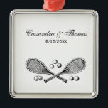 Sports Vintage Crossed Tennis Racquet Tennis Balls Metal Ornament<br><div class="desc">Sports Vintage Crossed Tennis Racquets, Tennis Balls ============ Customizable invitations and accessories with a stylized vintage image of a crossed tennis racquets surrounded by tennis balls You can easily customize these products by adding text fields, removing existing text fields, changing design images or adding additional images of your choice. You...</div>