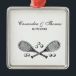 Sports Vintage Crossed Tennis Racquet Tennis Balls Metal Ornament<br><div class="desc">Sports Vintage Crossed Tennis Racquets, Tennis Balls ============ Customizable invitations and accessories with a stylized vintage image of a crossed tennis racquets surrounded by tennis balls You can easily customize these products by adding text fields, removing existing text fields, changing design images or adding additional images of your choice. You...</div>