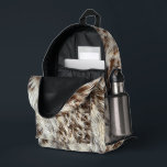 Spotted Horse / Cow Hide / Animal Fur Image Printed Backpack<br><div class="desc">***THIS IS NOT ANIMAL FUR - It is an image, printed onto the product. Looks like animal skin but it is a photo. * Dimensions: 17"x12.5"x5" * Made of durable Polyester Poplin * Two-chamber design with laptop storage pouch * Mesh side pocket (great for water bottles!) * If text is...</div>