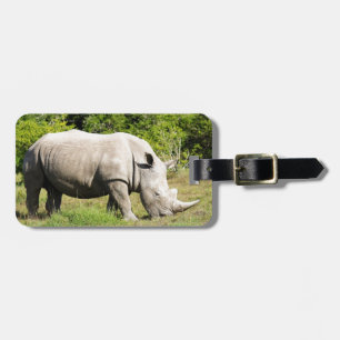 Spotting a Rhino feeding whilst on Safari Luggage Tag
