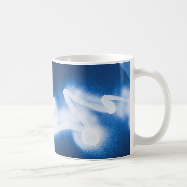Sprayed graffiti on blue metal coffee mug (Right)