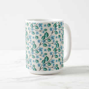Sprigs with green leaves and blue flowers. coffee mug