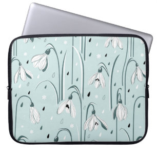 Spring background with delicate snowdrop flowers a laptop sleeve