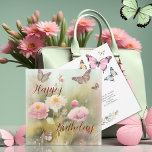 Spring Flowers and Butterfly Watercolor Birthday Card<br><div class="desc">🦋 Add a slice of springtime magic to your gift! Our birthday card is adorned with graceful butterflies and soft spring flowers against a calm green foliage backdrop. It's like giving a burst of nature's beauty. But here's the kicker – the birthday wish is on the back, ready to bring...</div>