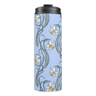 Spring flowers. Daffodil flowers interlaced into a Thermal Tumbler