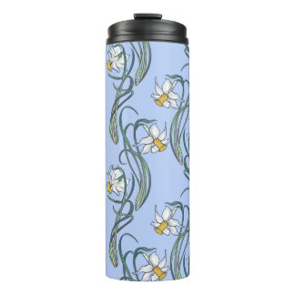 Spring flowers. Daffodil flowers interlaced into a Thermal Tumbler