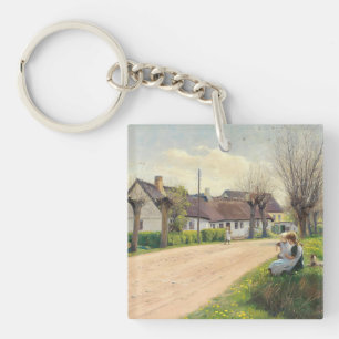 Spring in the village with girls on the roadside keychain