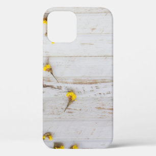 Spring yellow flowers, white plank decor. iPhone 12 case