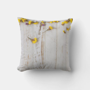 Spring yellow flowers, white plank decor. throw pillow